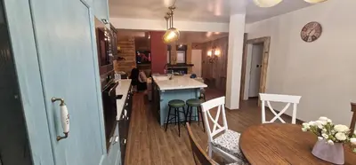 a kitchen with a sink and a counter top at Boutique Apartment Katerina in Bansko