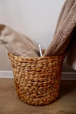 a wicker basket sitting on top of a floor at Hidden Courtyard Gem - House in Sofia Center in Sofia