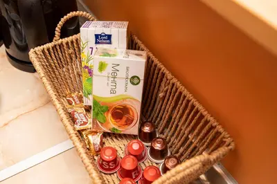 a wicker basket with medicines and a box on it at Casita Central - FREE Private Parking & Metro station in Sofia