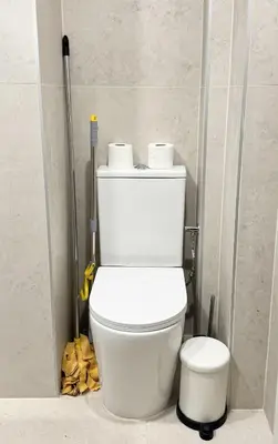 a bathroom with a toilet with two rolls of toilet paper at Cosy & Modern 1BD Flat close to NDK by Flat Mаnager in Sofia