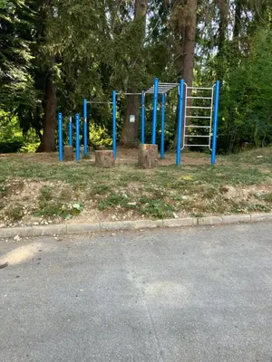 a row of blue poles in a park at Borovets Gardens apartment C-43 in Borovets