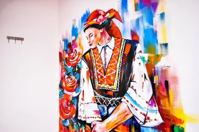a painting of a woman in a costume at Spacious 3BR in the Center - Kitchen Smart TV's in Sofia
