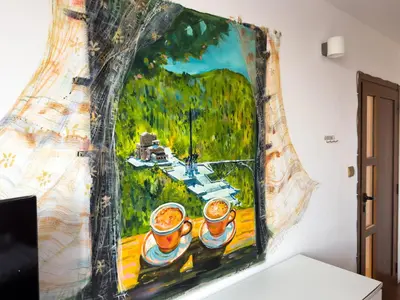 a painting of two coffee cups on a wall at Spacious 3BR in the Center - Kitchen Smart TV's in Sofia