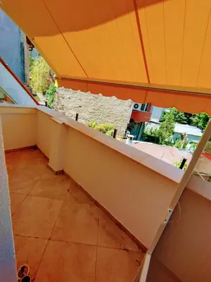 a view of a balcony with an orange roof at Moon House Red in Plovdiv