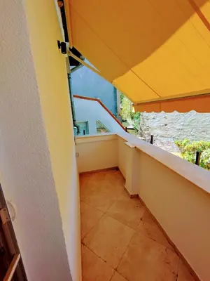 a balcony with a view of a room at Moon House Red in Plovdiv