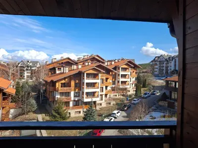 a view from a window of a apartment building at Илен C411 Panorama Resort Bansko in Bansko