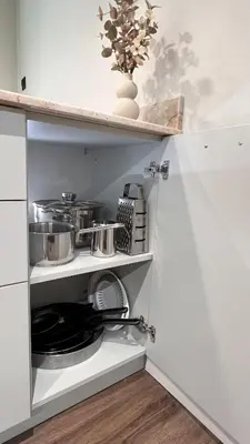 a kitchen with pots and pans on a shelf at 3 Спални - Електрическо Подово Отопление - Бърз WiFi - Веранда - В Гората - Warm Forest Nest Pamporovo in Pamporovo