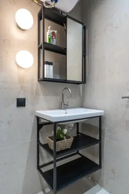 a bathroom with a sink and a mirror at 3 Спални - Електрическо Подово Отопление - Бърз WiFi - Веранда - В Гората - Warm Forest Nest Pamporovo in Pamporovo
