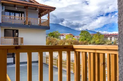 a balcony of a house with a view of a mountain at Iva's Dream Studio, Crafted with Love and Passion in Bansko