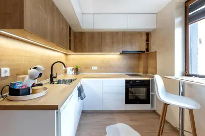 a kitchen with white cabinets and a sink at Iva's Dream Studio, Crafted with Love and Passion in Bansko