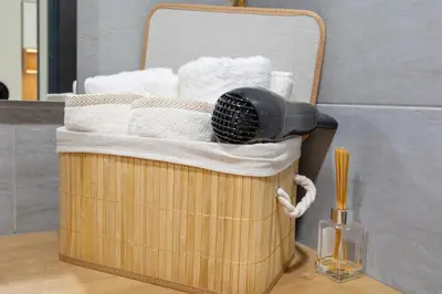 a drying rack with towels and a hair dryer at Iva's Dream Studio, Crafted with Love and Passion in Bansko
