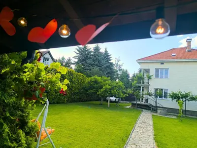 a view of a yard with a house at City Garden - Amazing Garden for party and friends in Kostinbrod