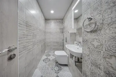 a bathroom with a toilet and a sink at NOAR - Free parking - Metro access in Sofia