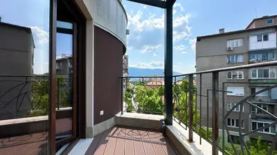 a balcony with a view of a building at Charming 2BD with Mountain View by Flat Mаnager in Sofia