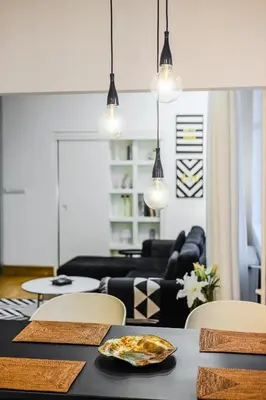 a living room with a table with a plate of food at Casa Desideria 2BAD 2BATH, PARKING , Vitosha Blvd in Sofia