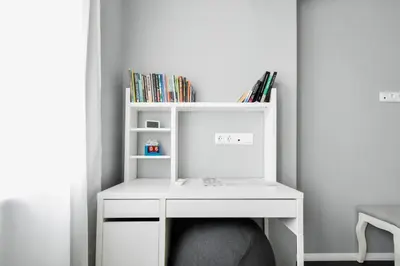 a white desk with a computer on top of it at Bright Central Sofia Flat with Coffee-Lovers Touch by Flat Mаnager in Sofia