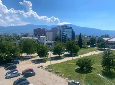 a group of cars parked in a parking lot at Student City Vitosha View Apartment in Sofia