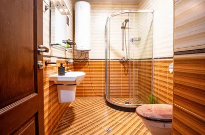a bathroom with a shower and a sink at Oxygen Time in Smolyan