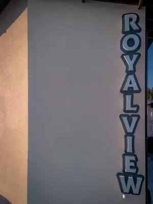 a sign that says ragnarok on the side of a building at Royal View Guest House in Dospat