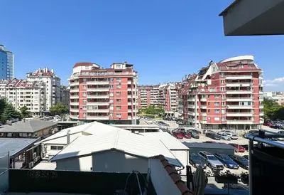 a view of a city with tall buildings and cars at BudgetWork-Friendly Apartment near Business Park in Sofia