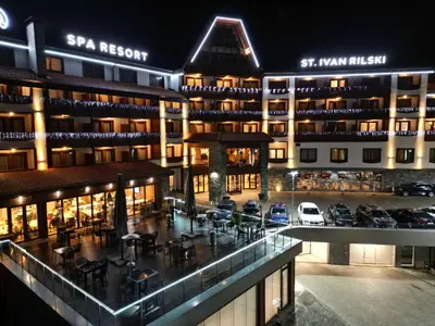 a view of the sar resort at night at Large 1bd apartment in 4star SPA resort Bansko in Bansko