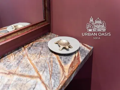 a plate with an elephant on a table in a room at Urban Oasis Sofia in Sofia
