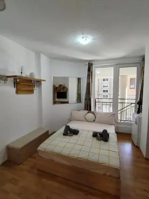 a bedroom with a large bed with two hats on it at Good Mood Room in Plovdiv