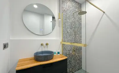 a bathroom with a sink and a mirror at Charming Sofia Center Stay for 4 by Flat Mаnager in Sofia