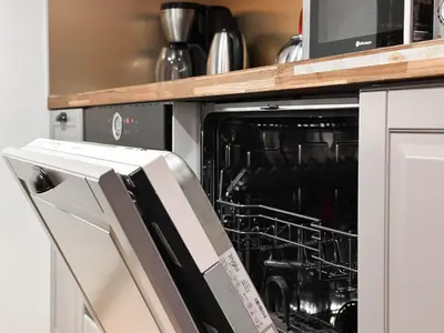 an oven with its door open in a kitchen at Charming Sofia Center Stay for 4 by Flat Mаnager in Sofia
