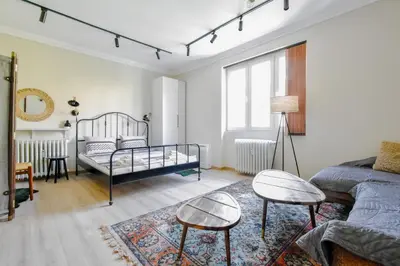 a living room with a bed and a couch at Charming Sofia Center Stay for 4 by Flat Mаnager in Sofia