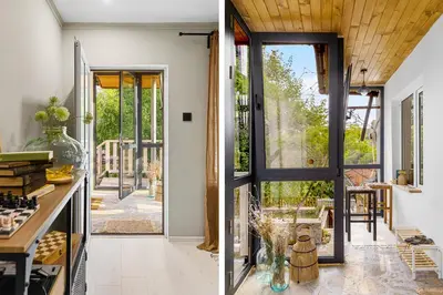 a kitchen with a door open to a patio at Villa YASNA - Art of slow living in Sredno Gradishte