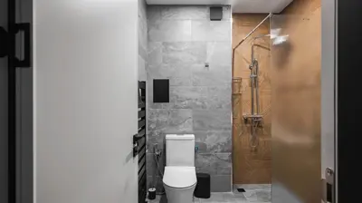 a bathroom with a toilet and a shower at Fresh & Modern Apartment with Balcony by Flat Mаnager in Sofia