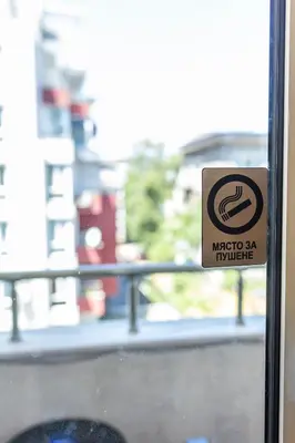 a sign on a window of a bus at Megy's 2nd Top Central Room in Sofia
