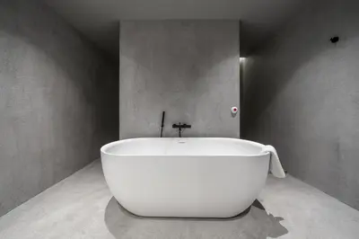 a large white bath tub in a room at Villa Rossa Luxury & Spa Residence in Narechenski Bani