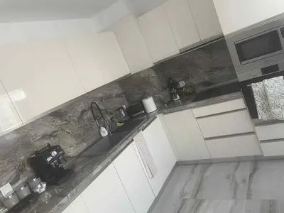 a kitchen with a sink and a counter top at 2 Bedroom apartment in Gotse Delchev