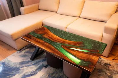 a living room with a couch and a wooden coffee table at 1 minute to main Street & NDK & Free Parking in Sofia