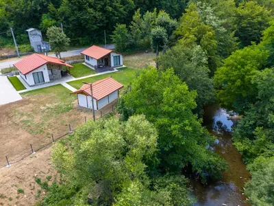 an aerial view of two houses and a river at Двете къщи село Бели осъм in Beli Osŭm