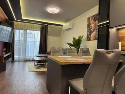a waiting room with chairs and a table and aocrinologistacistacistacistacist at Dream Home A21 in Sofia