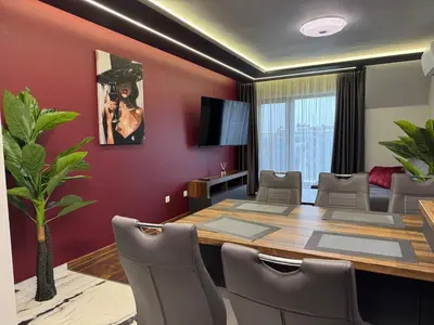 a conference room with a table and chairs at Dream Home A21 in Sofia