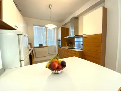 a bowl of fruit on a counter in a kitchen at Zaimov Penthouse with great view in Sofia