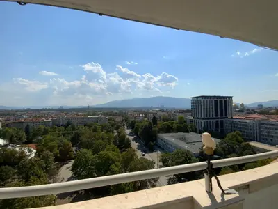 a view of a city from a balcony at Zaimov Penthouse with great view in Sofia