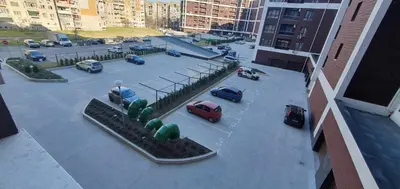 an aerial view of a parking lot with cars at SUPERsonicondo in Plovdiv