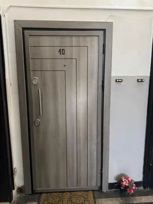 a metal door with the number on it at Happy Day in Sofia