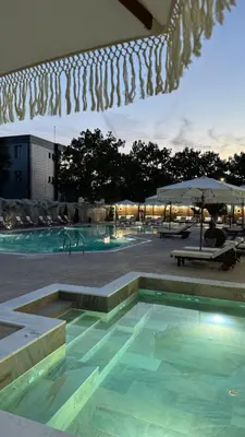 a large swimming pool with at Ивелия Хотел и Спа - Ivelia Hotel & SPA in Dŭbnitsa