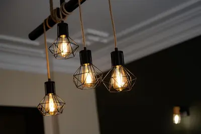 a group of lights hanging from a ceiling at 2 DeLuxe Apartments, Top Center Free Parking, 4 BDR in Sofia