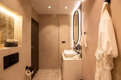 a bathroom with a shower and a sink at Art Retreat Zaimov in Sofia