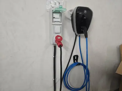 a phone with a cord hooked up to a wall at Apartment Maritsa View 1 in Plovdiv