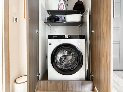 a washer and dryer in a small room at Contemporary City Stay by Flat Mаnager in Sofia