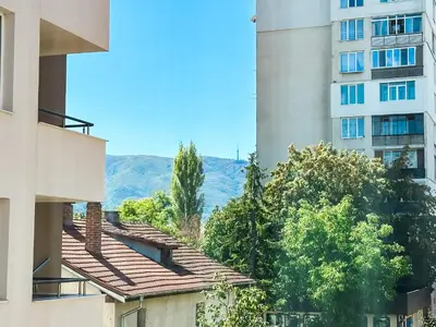 a view of a building and trees and a building at Contemporary City Stay by Flat Mаnager in Sofia