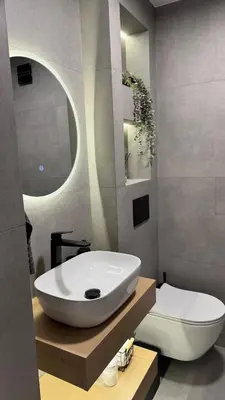 a bathroom with a white sink and a toilet at Urban Hive - Central Designer Studio in Lozenets in Sofia